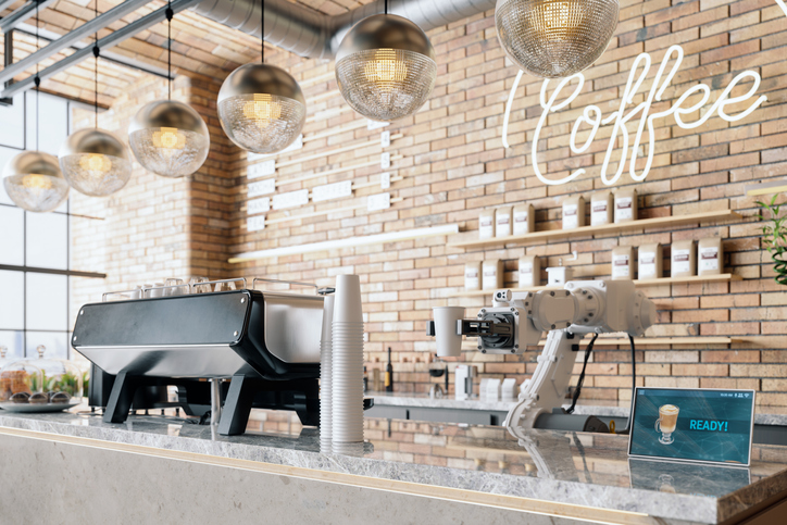 Robotic arm with artificial intelligence preparing coffee in coffee shop.